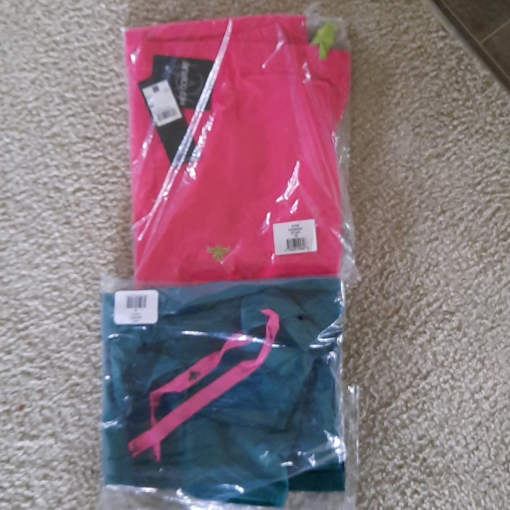 Two pair of Med Couture scrub pants